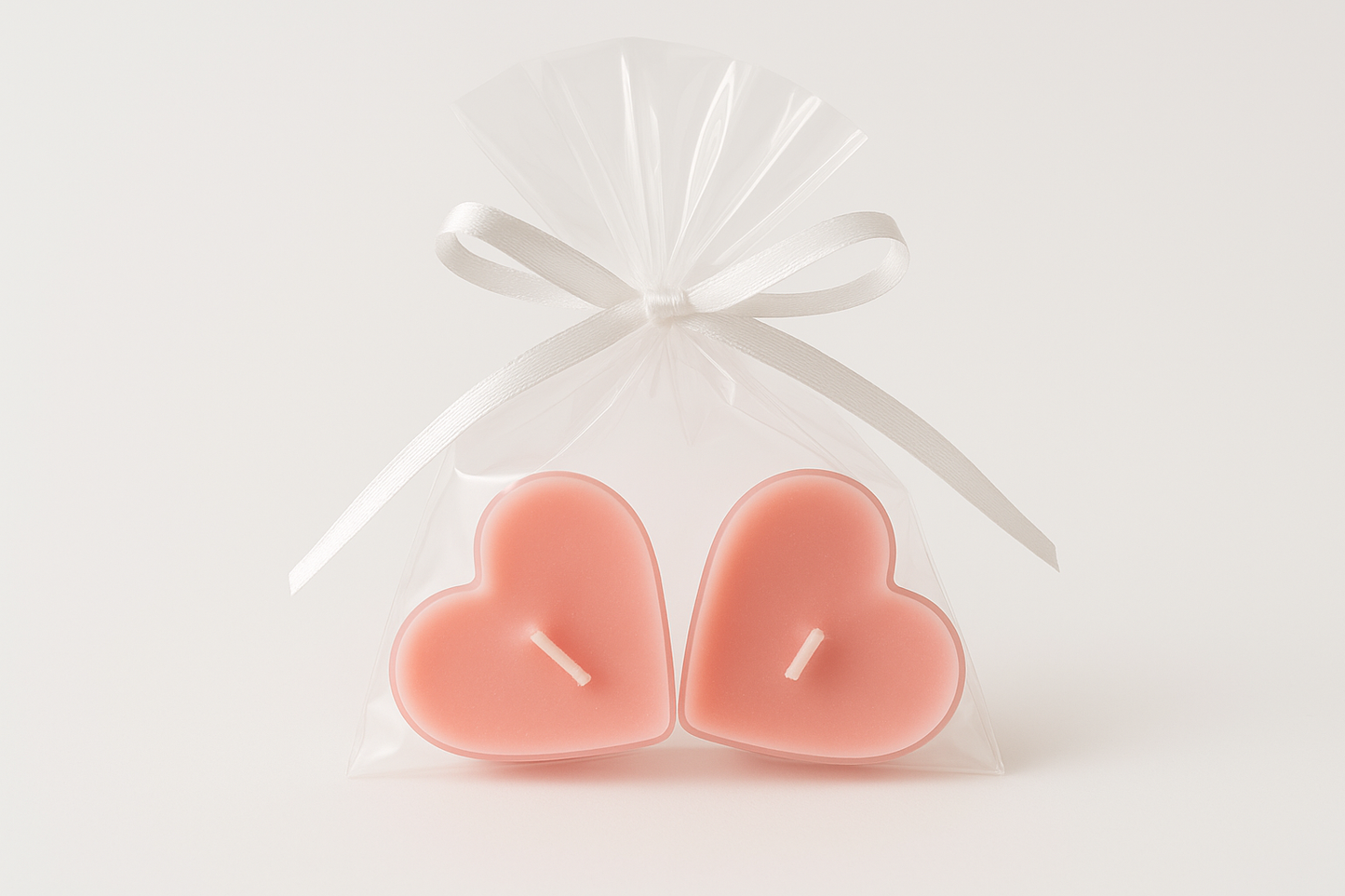Professional photo of 2 heart-shaped candles in bag