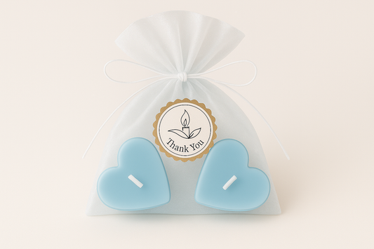Baby blue heart candles in gift bag